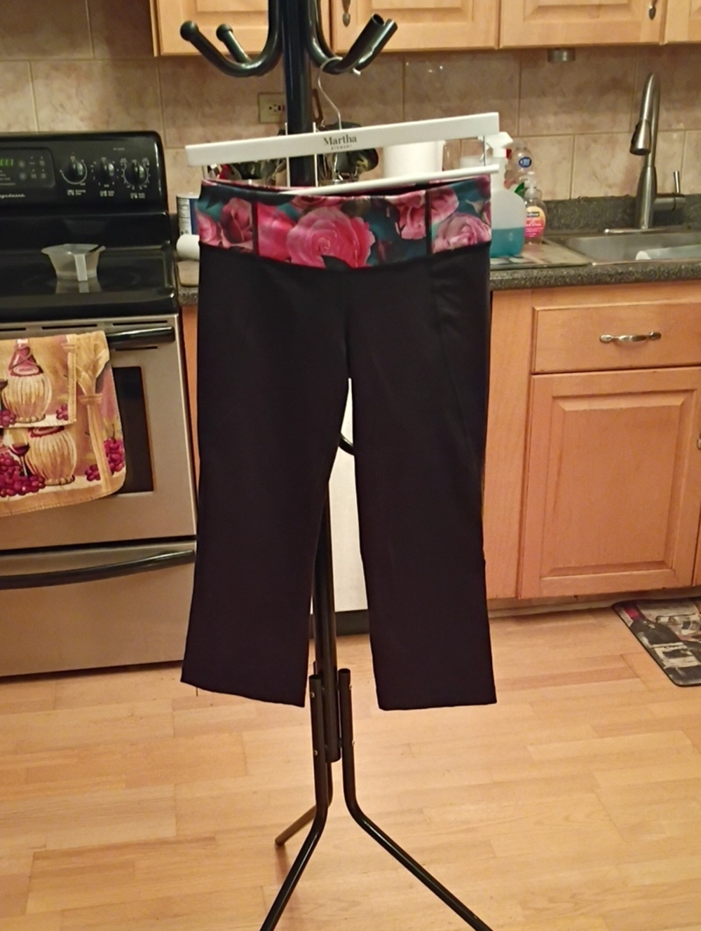 lululemon athletica Black Capri Pants with Pink Floral Fold-Over Waistband
